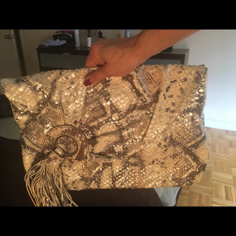 Gorgeous never used snakeskin clutch